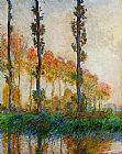 Three Trees in Autumn by Claude Monet